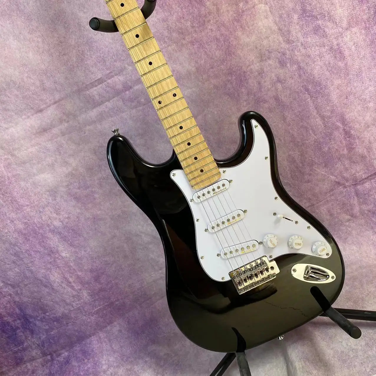 Electric guitar, maple fretboard, SSS pickups, basswood body, chrome hardware, 22 frets, 6 strings, in stock